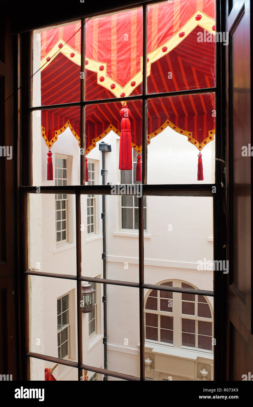 View through window to awning in courtyard Stock Photo