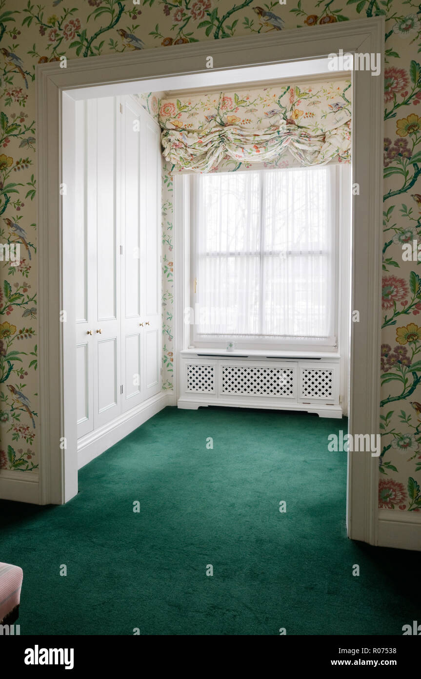 Recessed window with green carpet Stock Photo