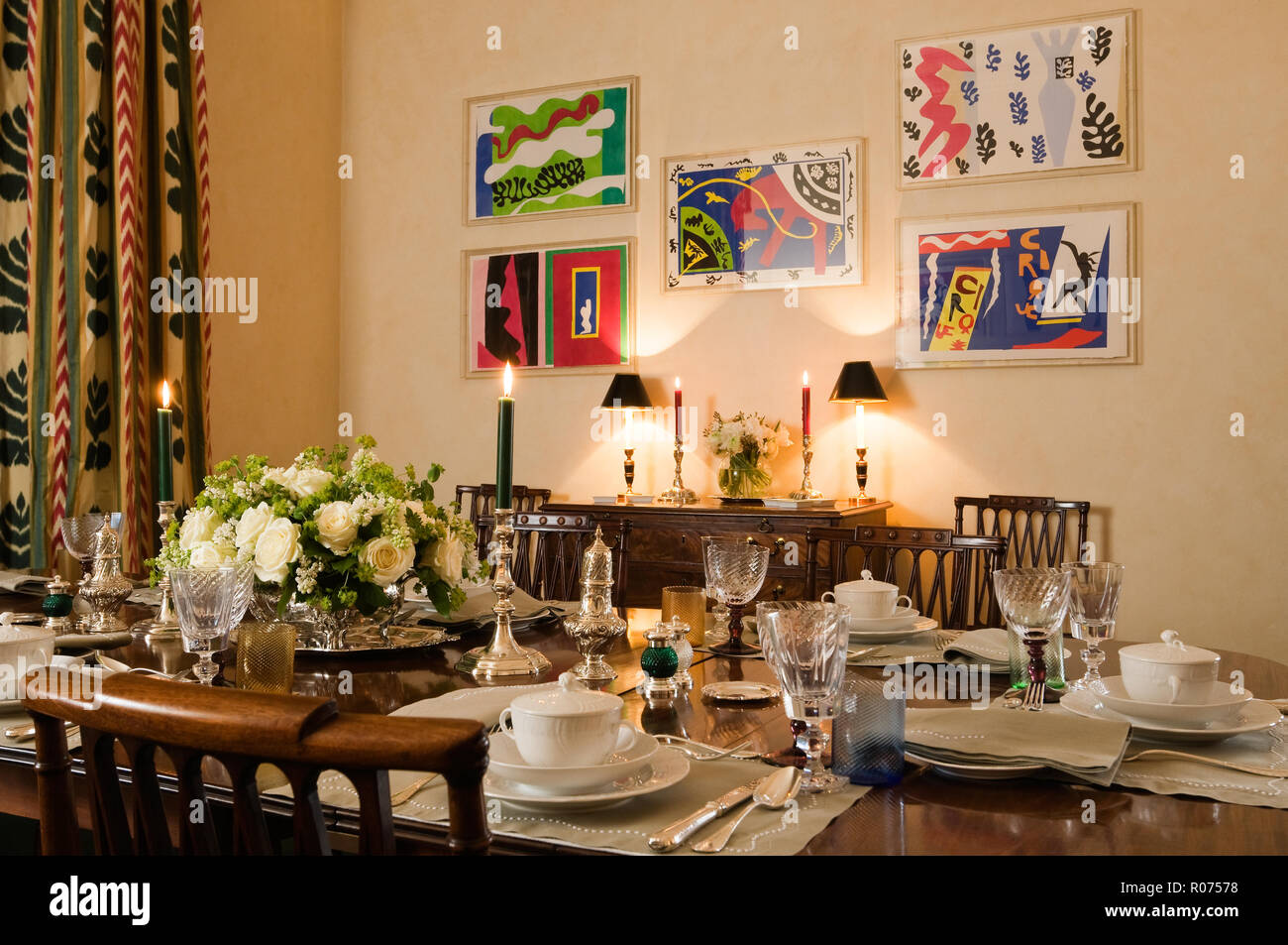 Set dining table with modern art Stock Photo Alamy