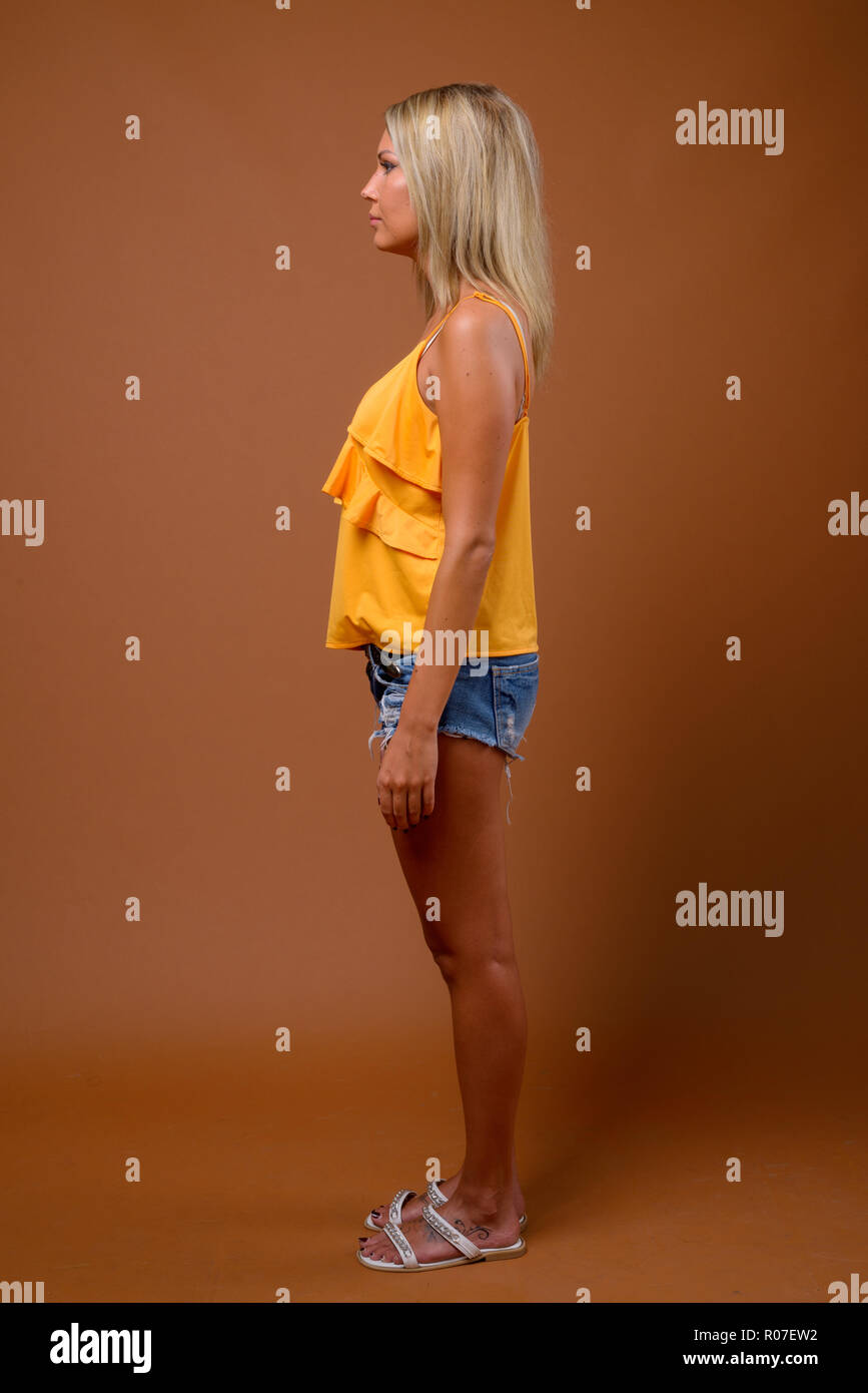 Blonde woman full body hi-res stock photography and images - Alamy