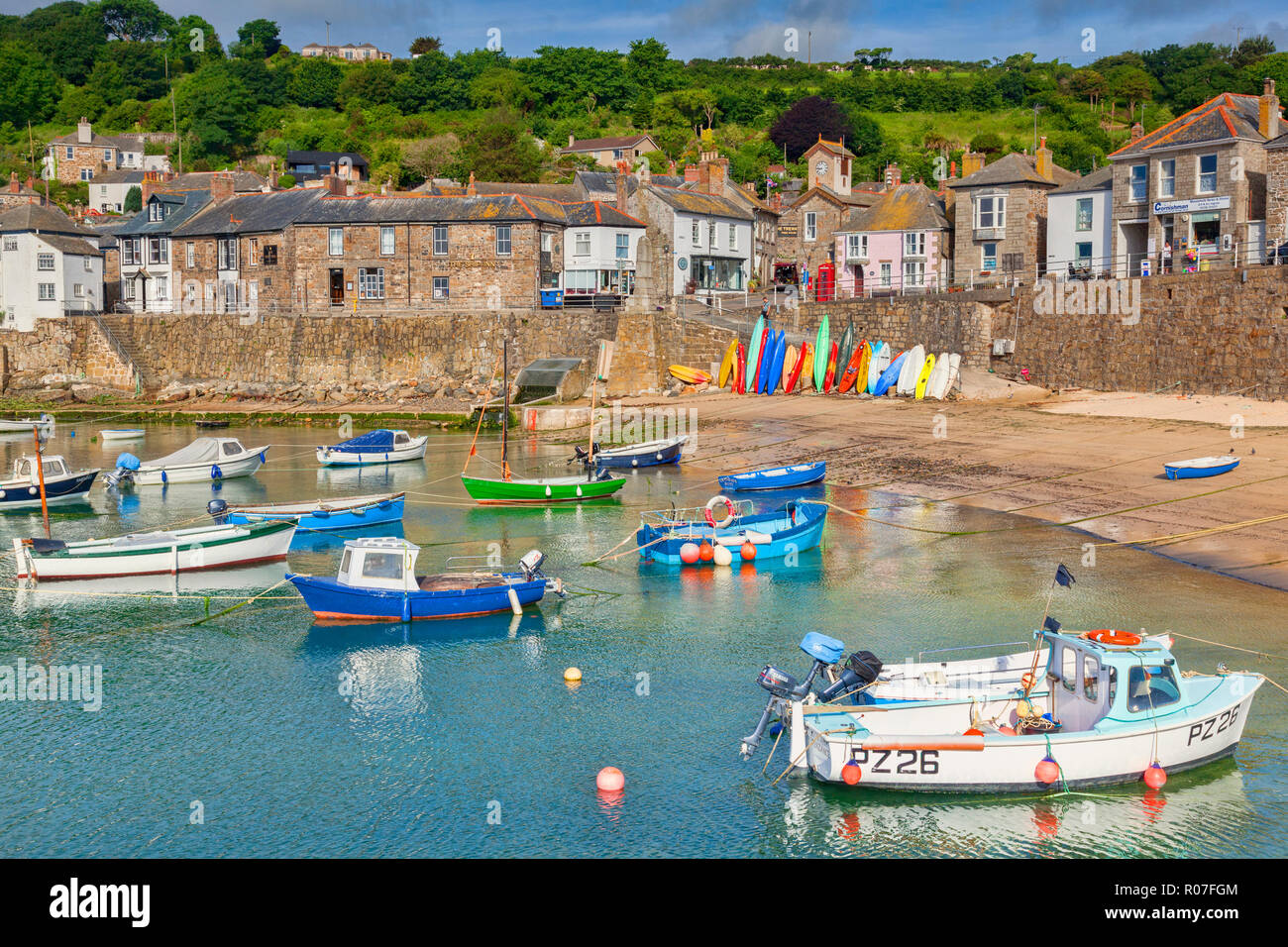 15 June 2018: Mousehole, Cornwall, UK - The harbour and village. Stock Photo