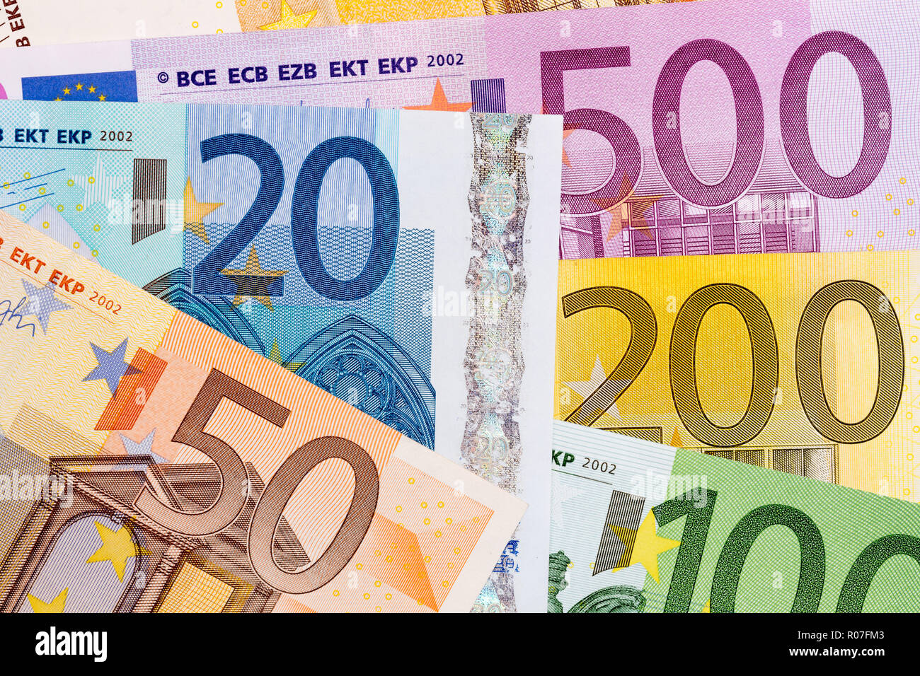 Many euro banknotes of different value on macro. Stock Photo