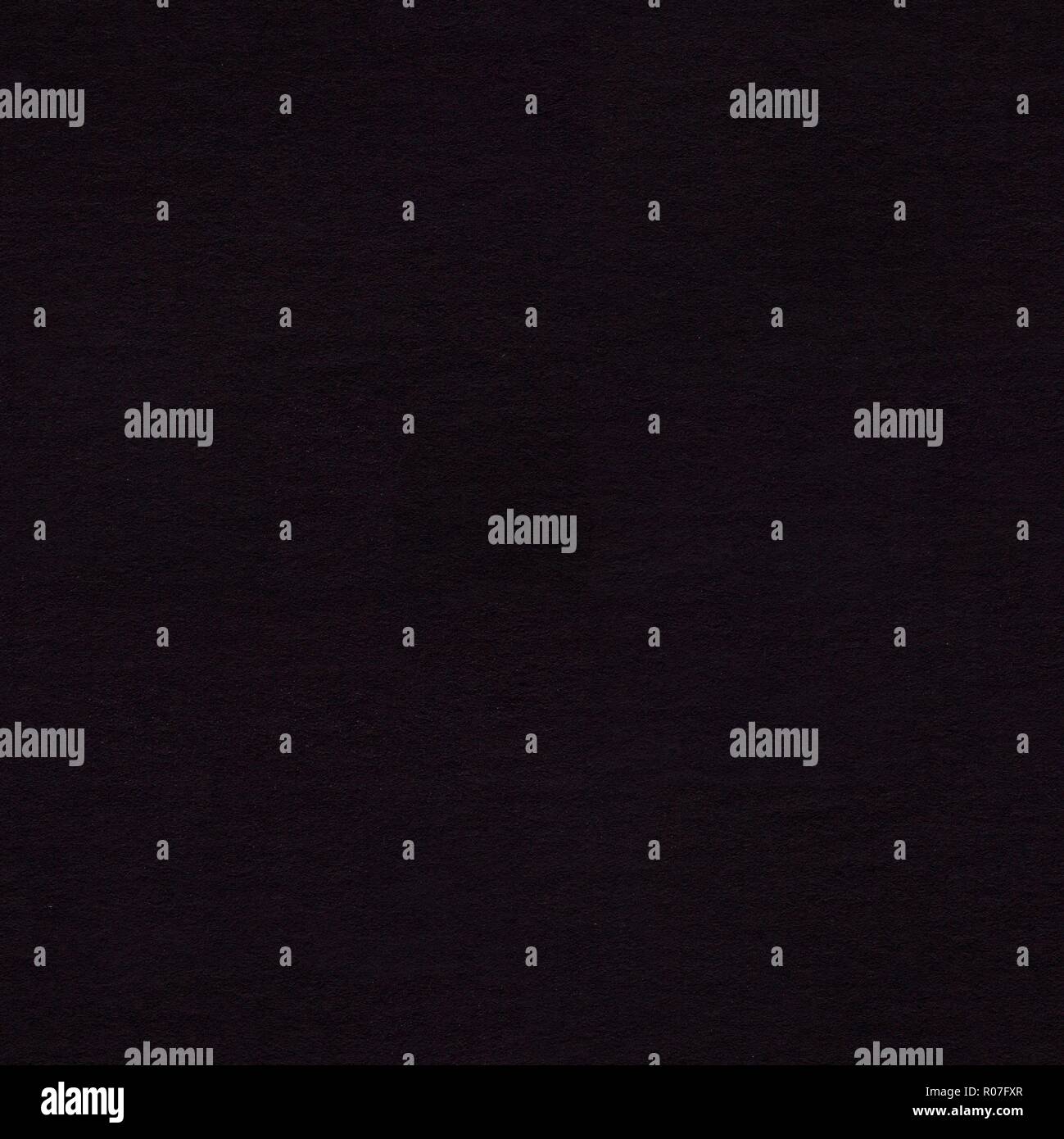 Background from black paper. Seamless square texture, tile ready. Stock Photo