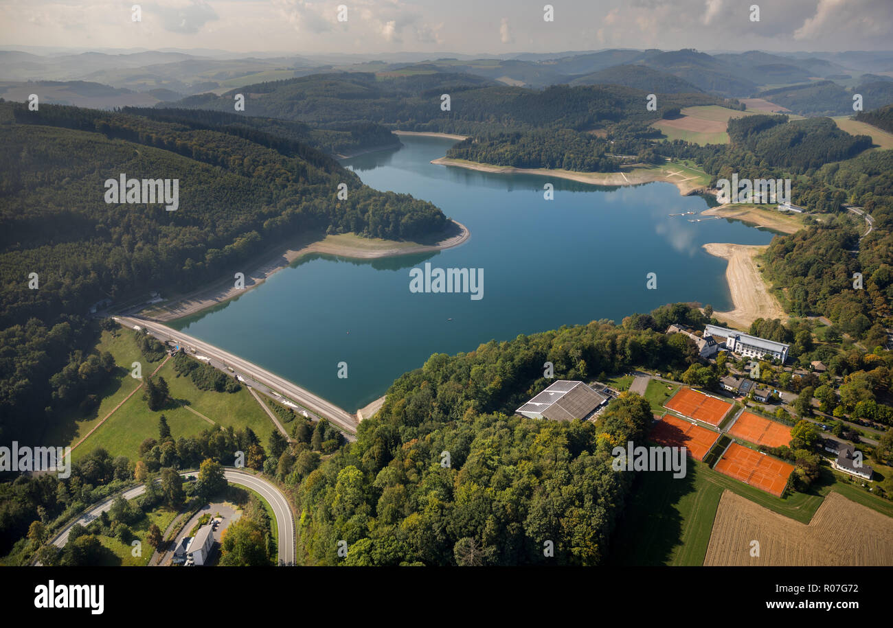 Aerial view, dam, Lake, Hennesee in the Sauerland-Rothaargebirge Nature Park dams the water of the hen, reservoir, Hennesee at low tide, Berghausen, M Stock Photo