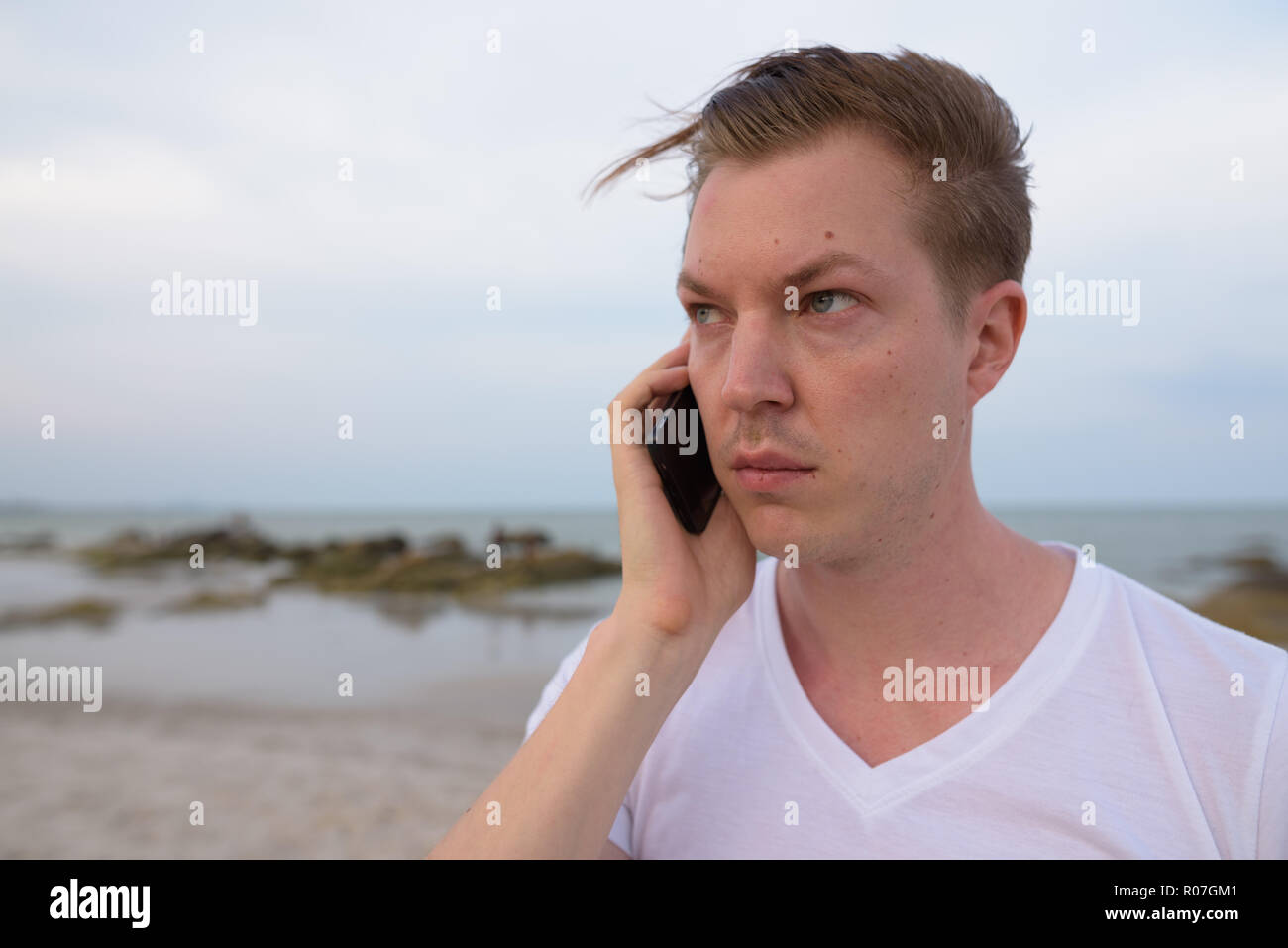 Man thinking on beach hi-res stock photography and images - Alamy
