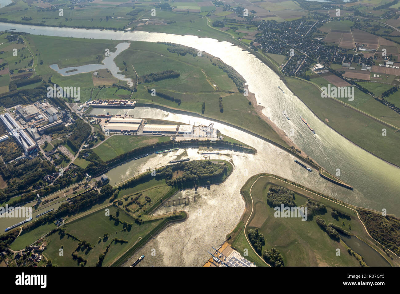 Aerial view, mouth Wesel-Datteln-Kanal in the Rhine, port Emmelsum, Rhine port, Lock Friedrichsfeld, Lippedorf, Voerde, Ruhr area, North Rhine-Westpha Stock Photo
