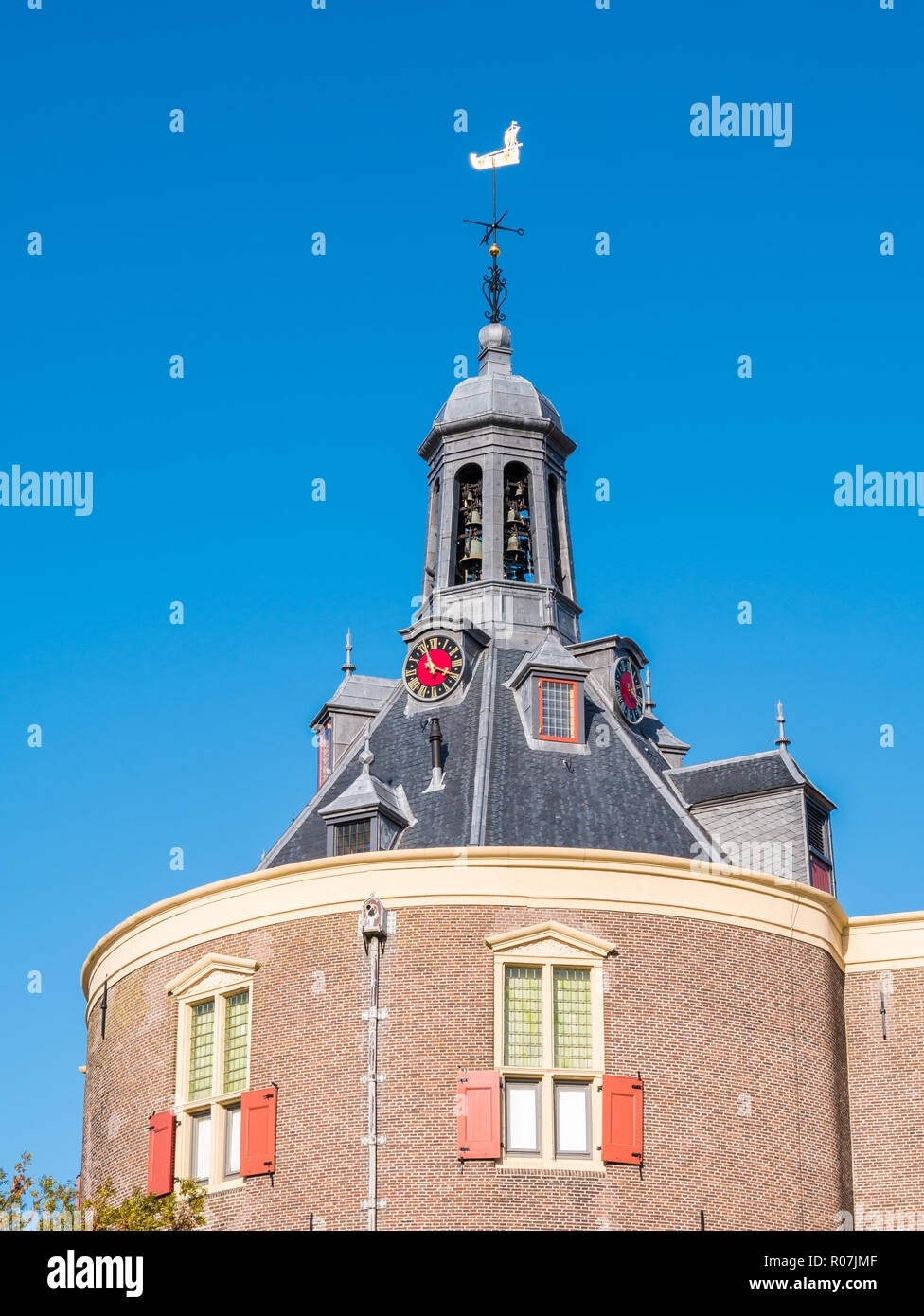 Top of Drommedaris south city gate in harbour of Enkhuizen, North Holland, Netherlands Stock Photo