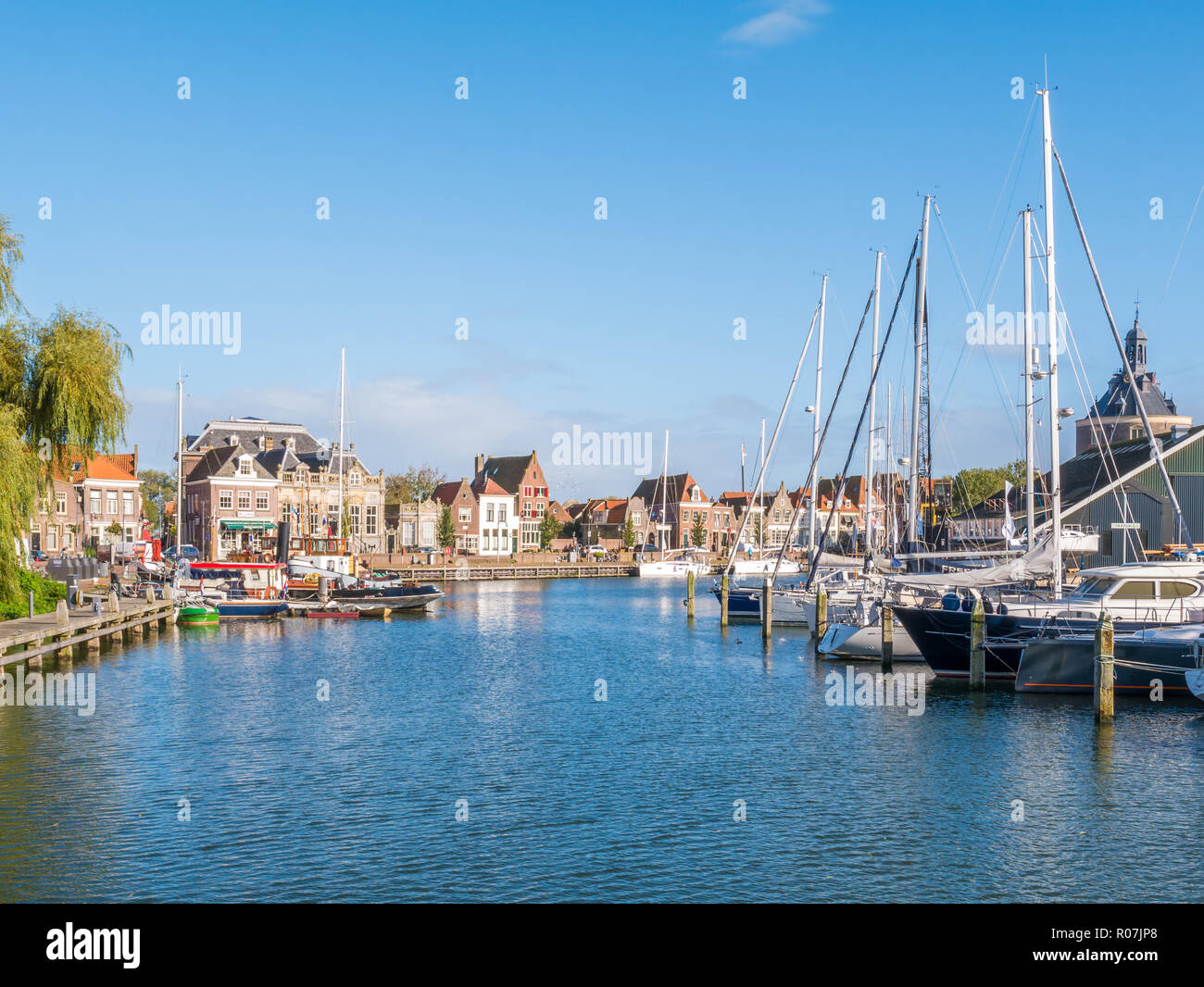 Boats in old harbour of city of Enkhuizen, North Holland, Netherlands Stock Photo
