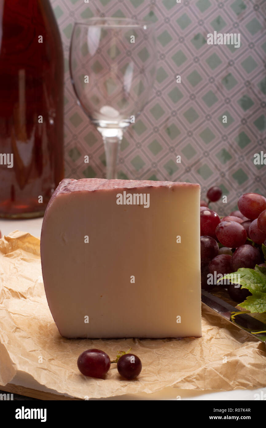 Traditional Spanish cheese, one piece of Murcian wine cheese from goat