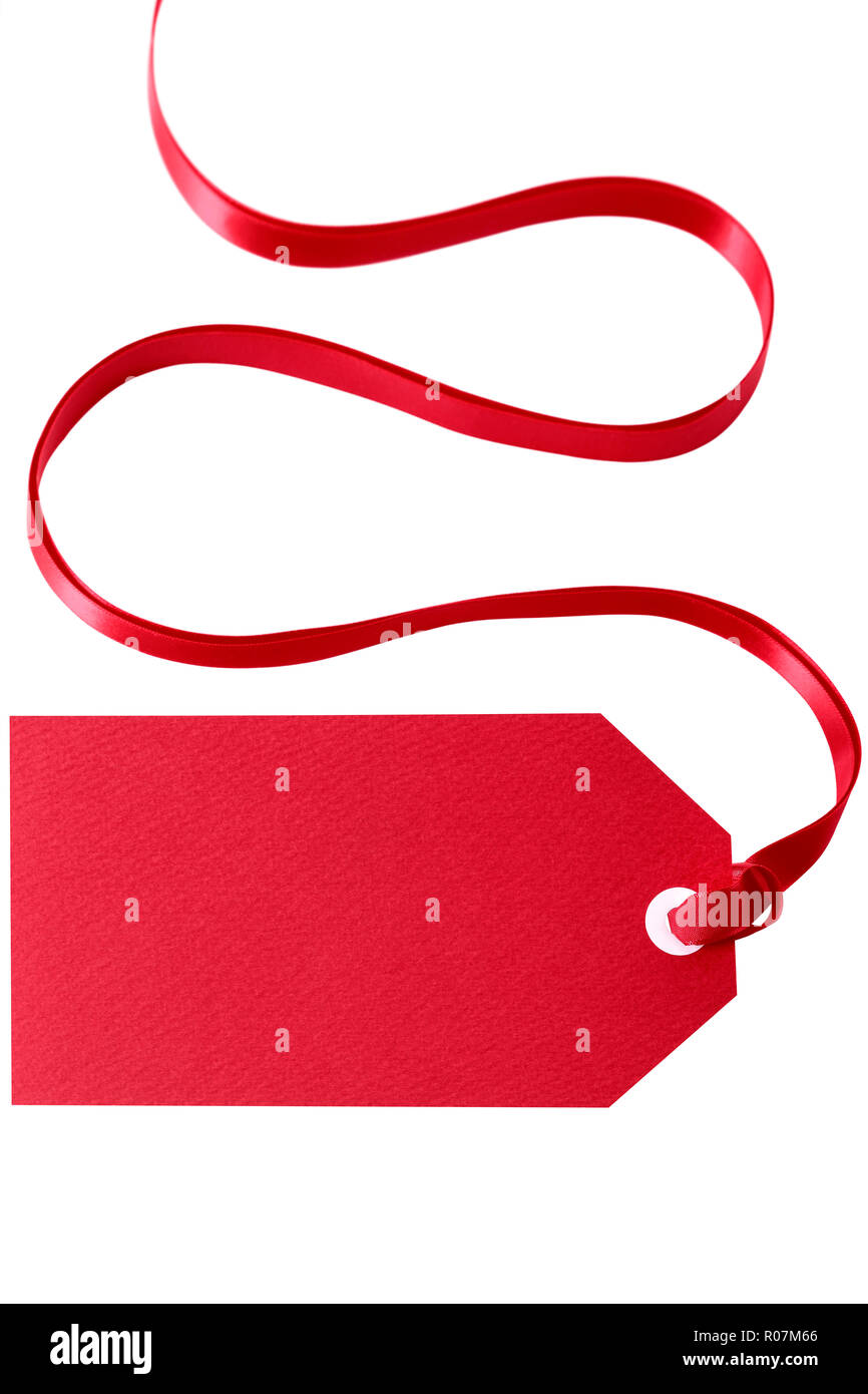 Red gift tag or price ticket with ribbon isolated vertical Stock Photo