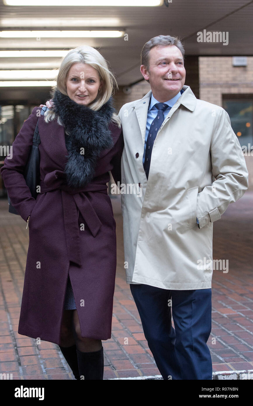 Conservative MP Craig Mackinlay with his wife Kati outside Southwark Crown Court in London, where he is on trial alongside staff accused of overspending on expenses during his successful 2015 general election campaign against the then-Ukip leader in South Thanet, Kent. Stock Photo