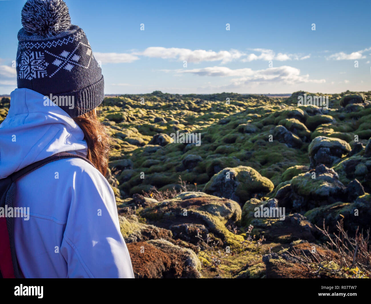 Tourist girl looking at lava fields in Skaftareldahraun, Iceland Stock Photo