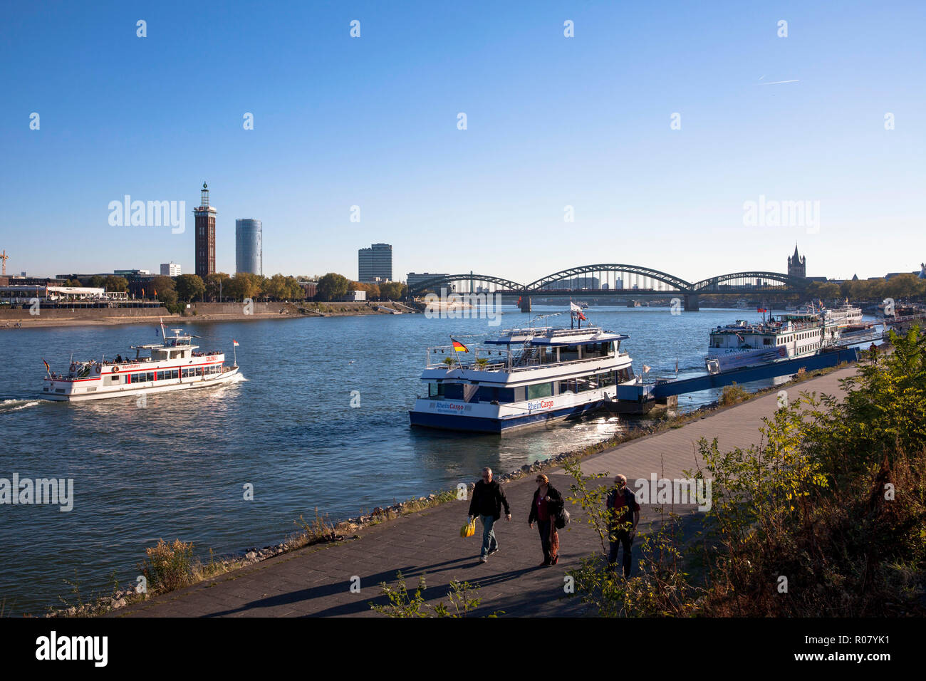 view across the river Rhine to the district Deutz, the old tower of the former exhibition center, the CologneTriangle skyscraper, the Lanxess Tower, t Stock Photo