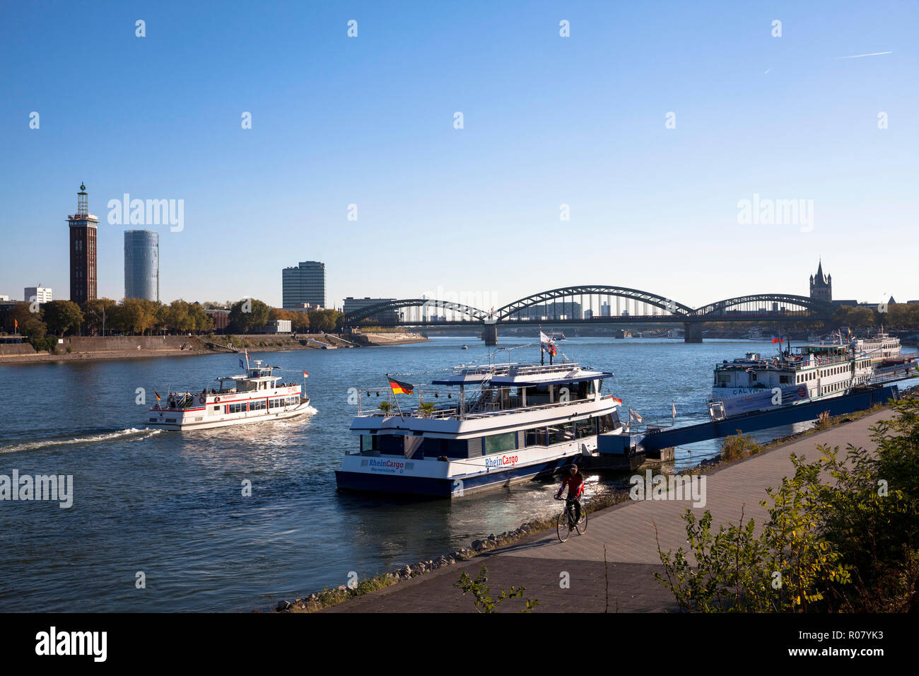 view across the river Rhine to the district Deutz, the old tower of the former exhibition center, the CologneTriangle skyscraper, the Lanxess Tower, t Stock Photo