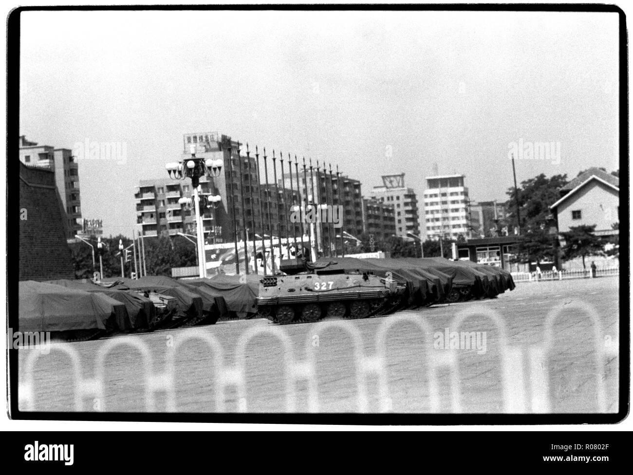 China Beijing in 1989. Chinese army troops occupy positions on Tiananmen Square in the centre of Beijing a week after the massacre of student protesters in June 1989 Photographs of Chinese army and security personel gurding the area in and around Tiananmen Square, taken secretly from inside a blacked out taxi as photographers were under threat of being arrested if they worked openly in the area around Tiananmen Square after the massacre. APC, Armoured Personel Carriers near the square. Wikipeadia: The Tiananmen Square protests of 1989, commonly known in mainland China as the June Fourth Incide Stock Photo