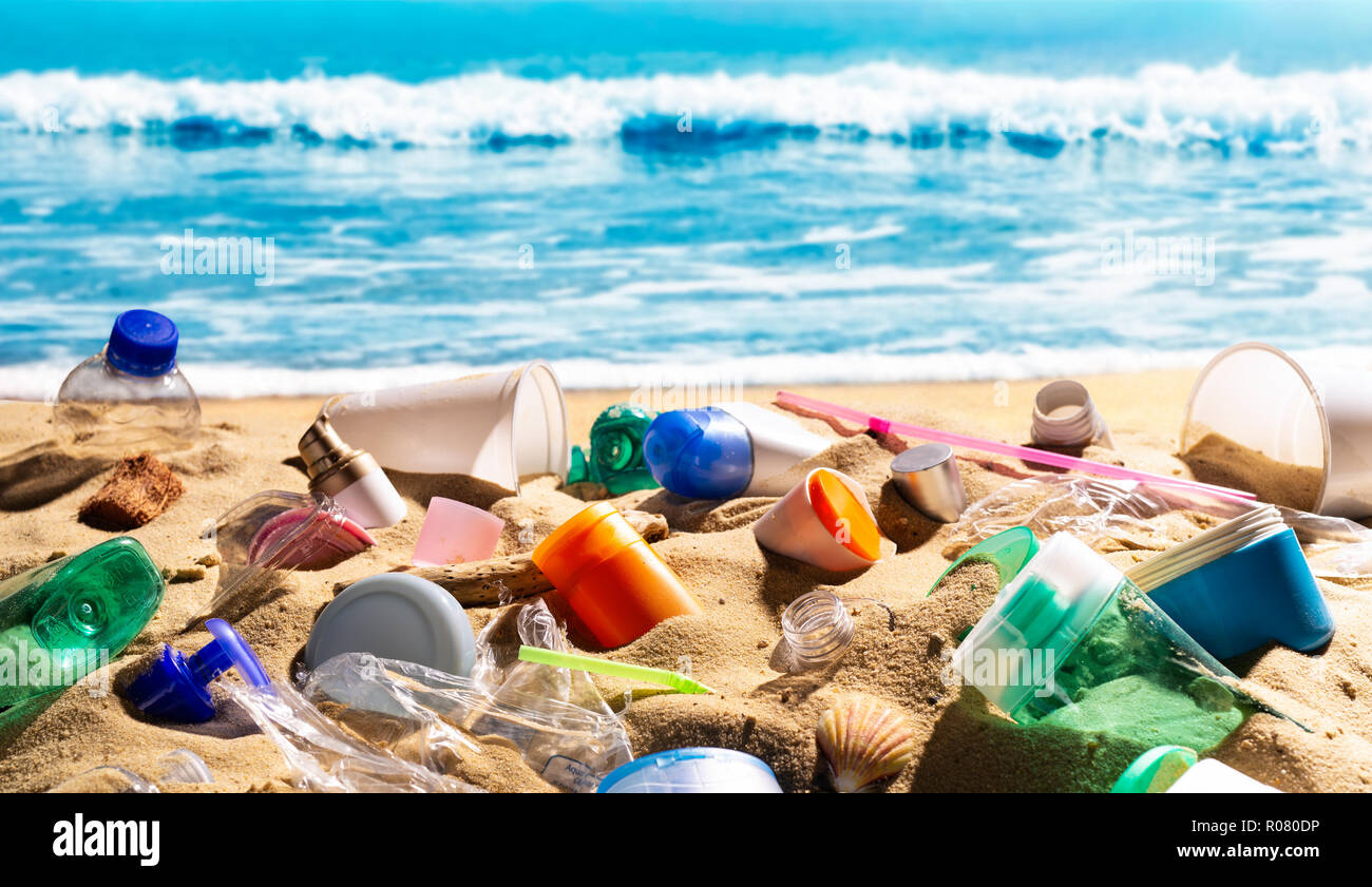 Plastic waste pollutes a wonderful sandy beach [M] Stock Photo