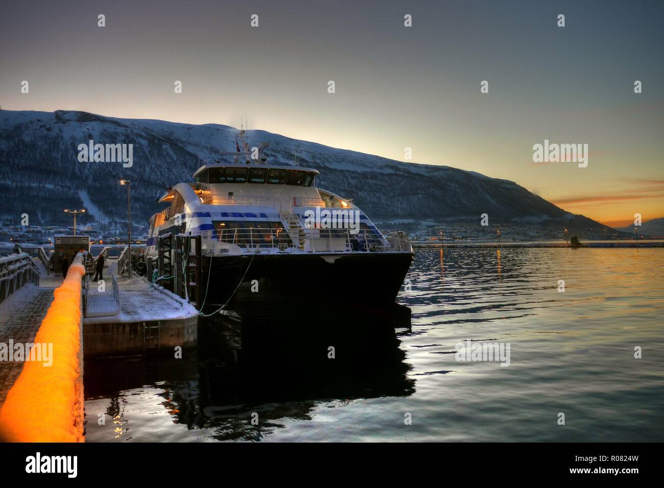 Ferry to Harstad in Tromso during polar day, Norway Stock Photo