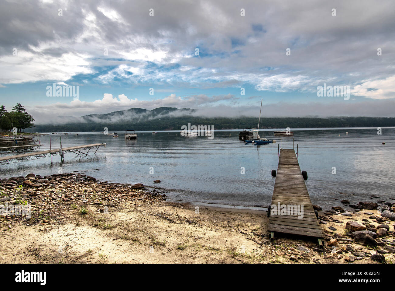 Small bay with boats on a cloudy morning Stock Photo