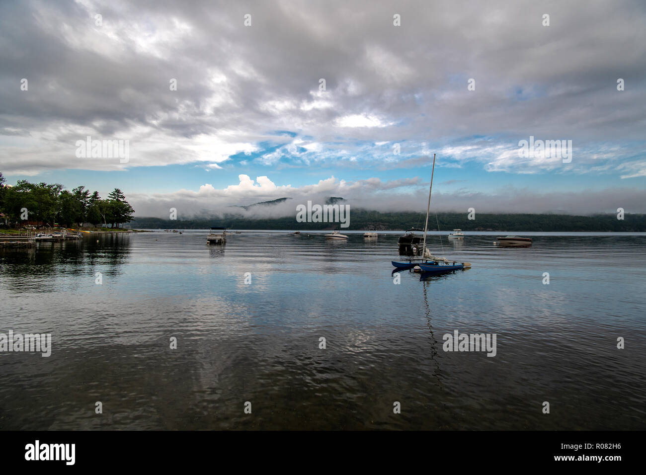 Small bay with boats on a cloudy morning Stock Photo