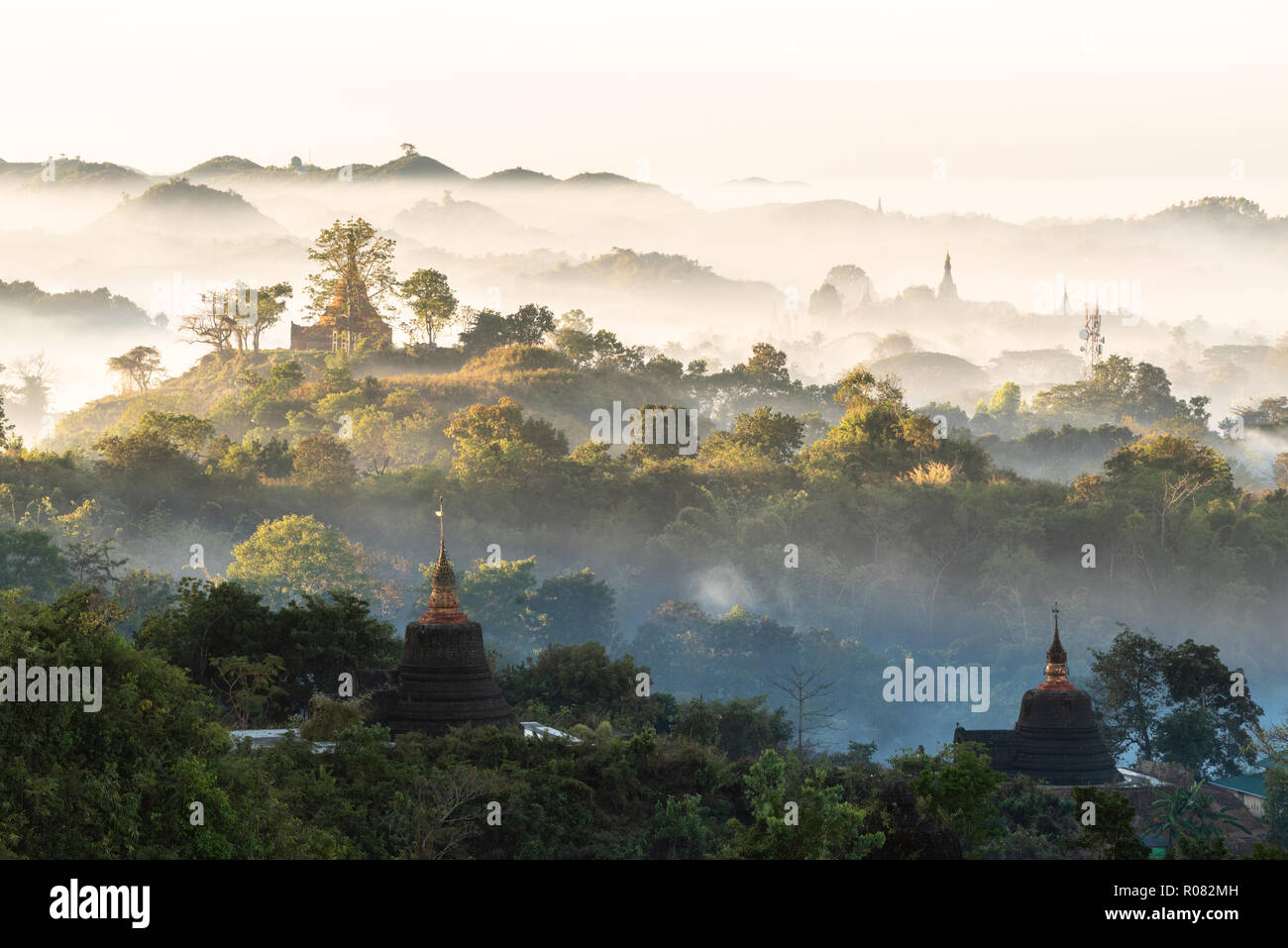 temple of the ancient Mrauk U kingdom in the morning fog, Myanmar Stock Photo