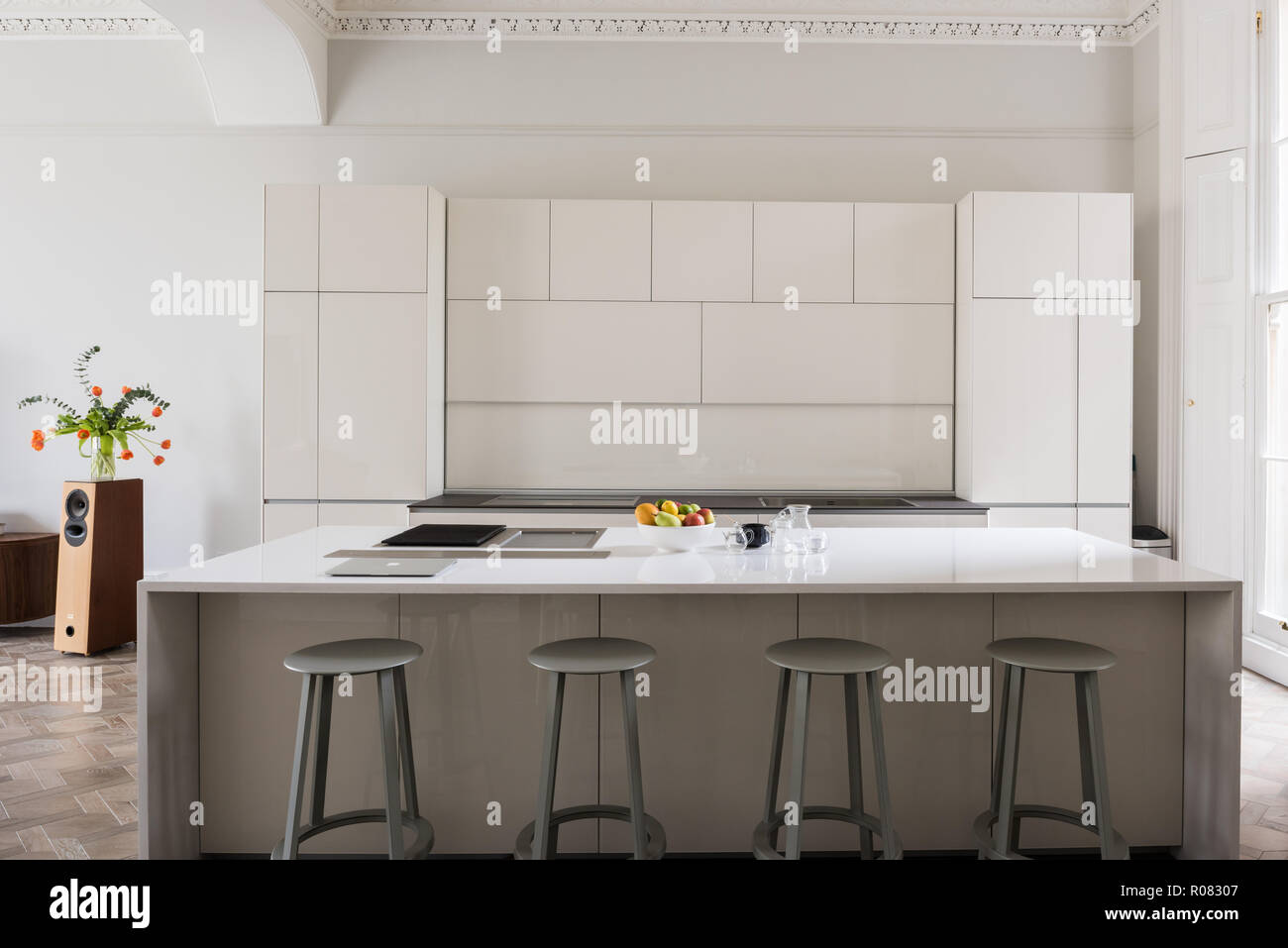 White kitchen with stools Stock Photo