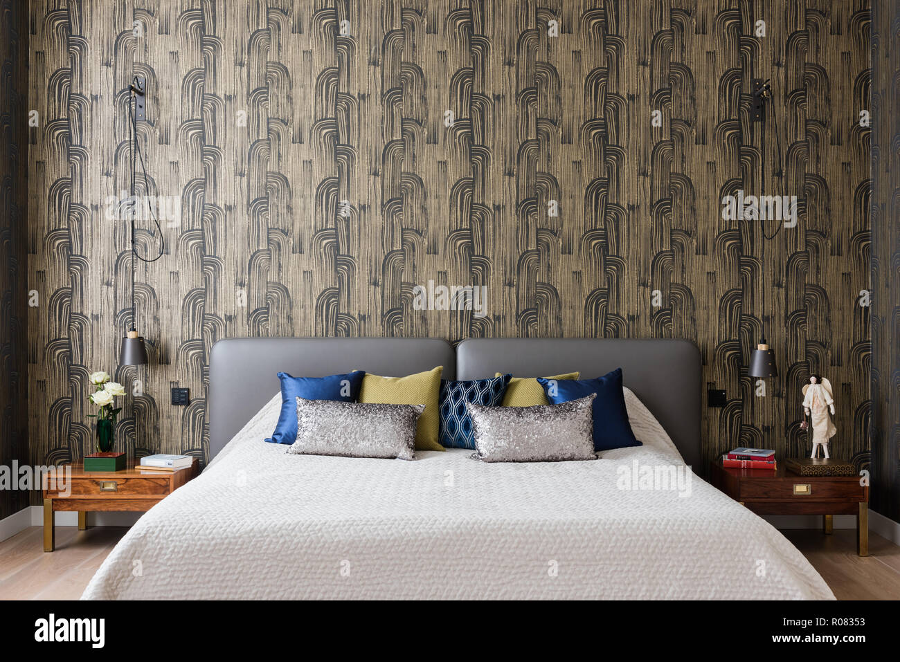 Modern Bedroom With Patterned Wallpaper Stock Photo Alamy