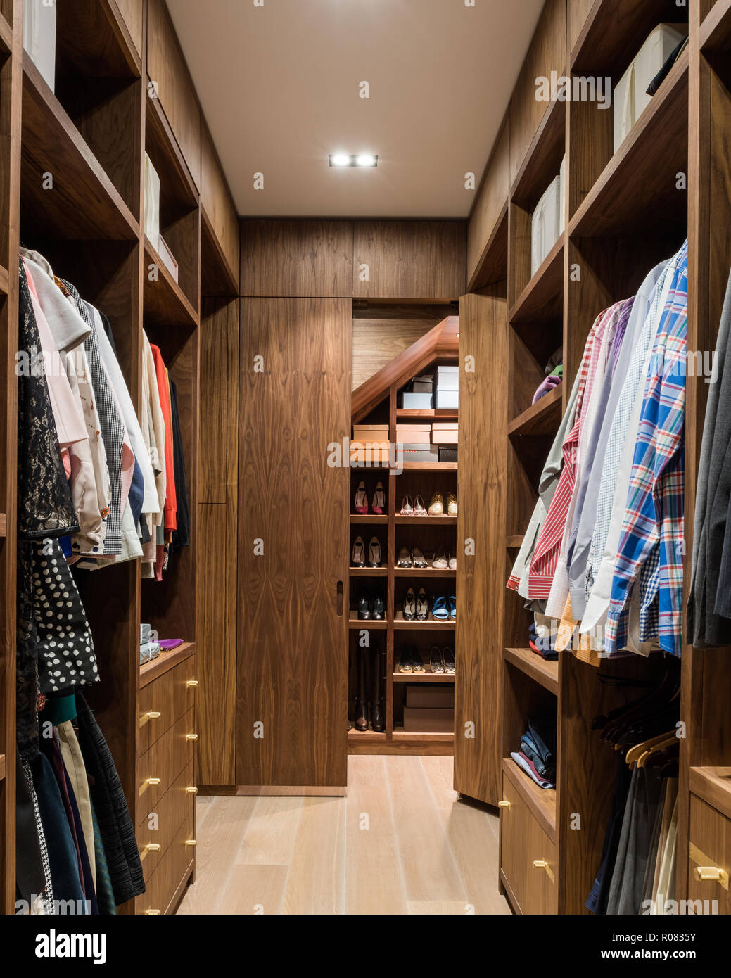 Wooden walk in wardrobe Stock Photo