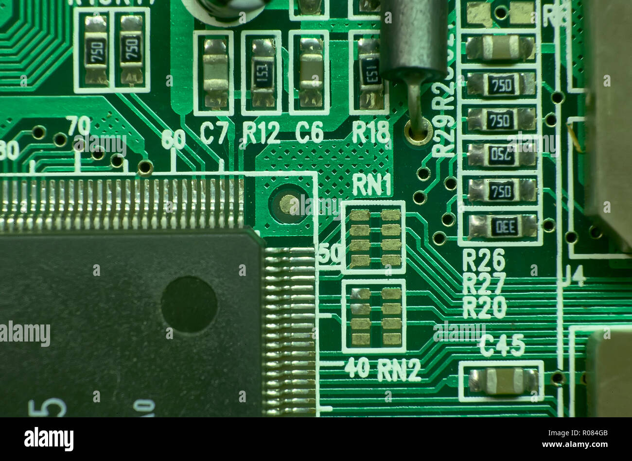 contacts and electronic circuits printed with various components and microprocessors: excellent texture for graphic projects. Stock Photo