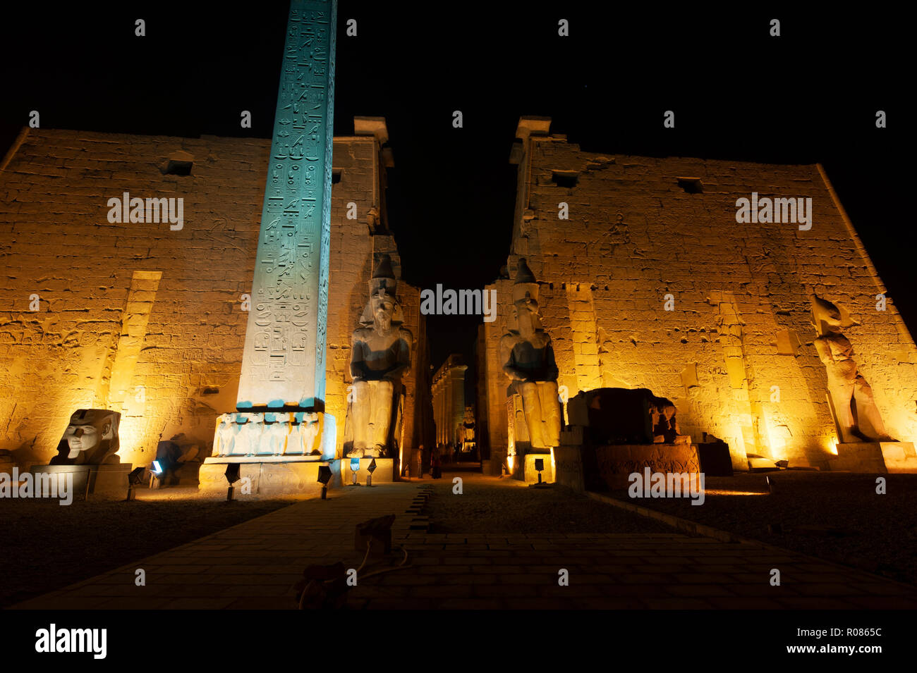 Entrance to Luxor Temple at night, a large Ancient Egyptian temple complex located on the east bank of the Nile River. Stock Photo