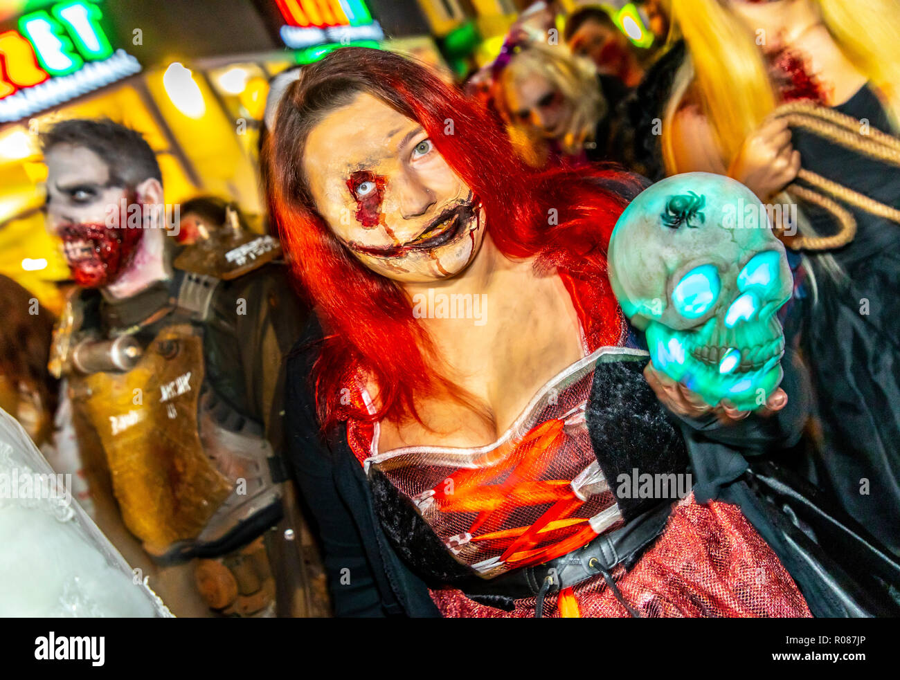 Participants of the zombie walk in Essen, on Halloween evening, in the city center, many hundreds of zombie and monster performers meet and move throu Stock Photo