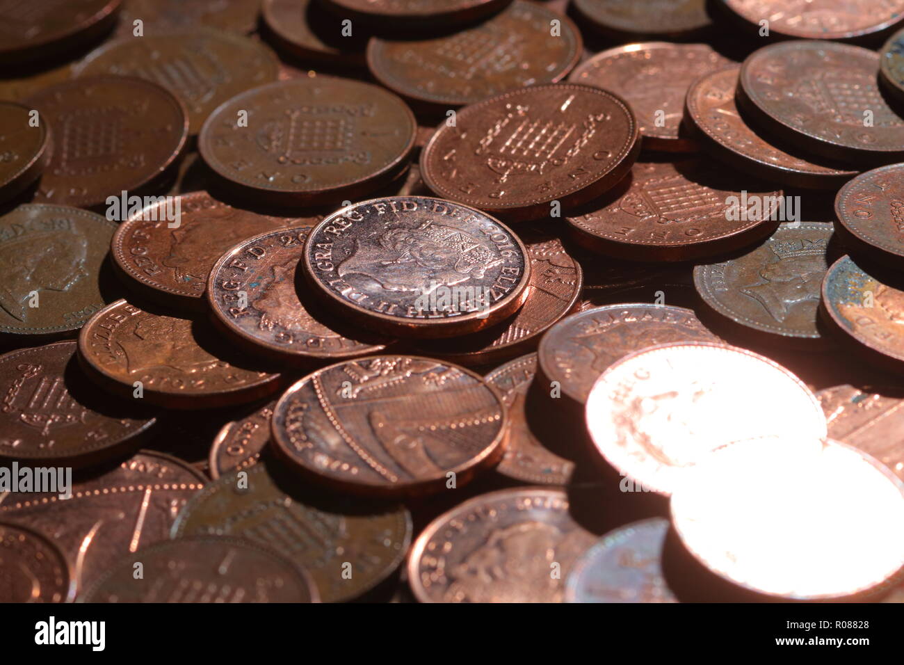 A heap of one pence coins Stock Photo