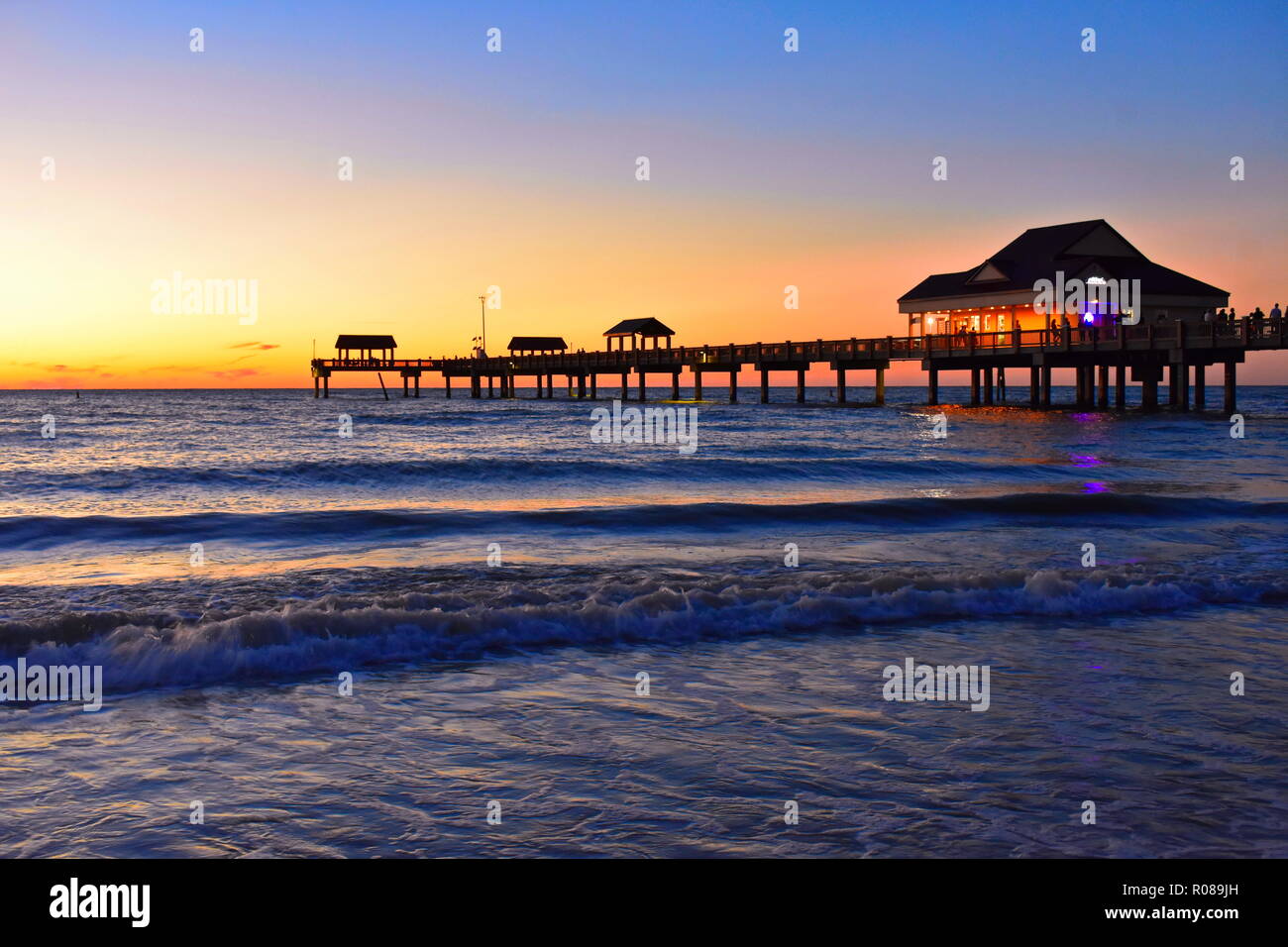 Clearwater, Florida. October 21,2018  Panoramic view of Pier 60 on colorful sunset background at Clearwater Beach. Stock Photo