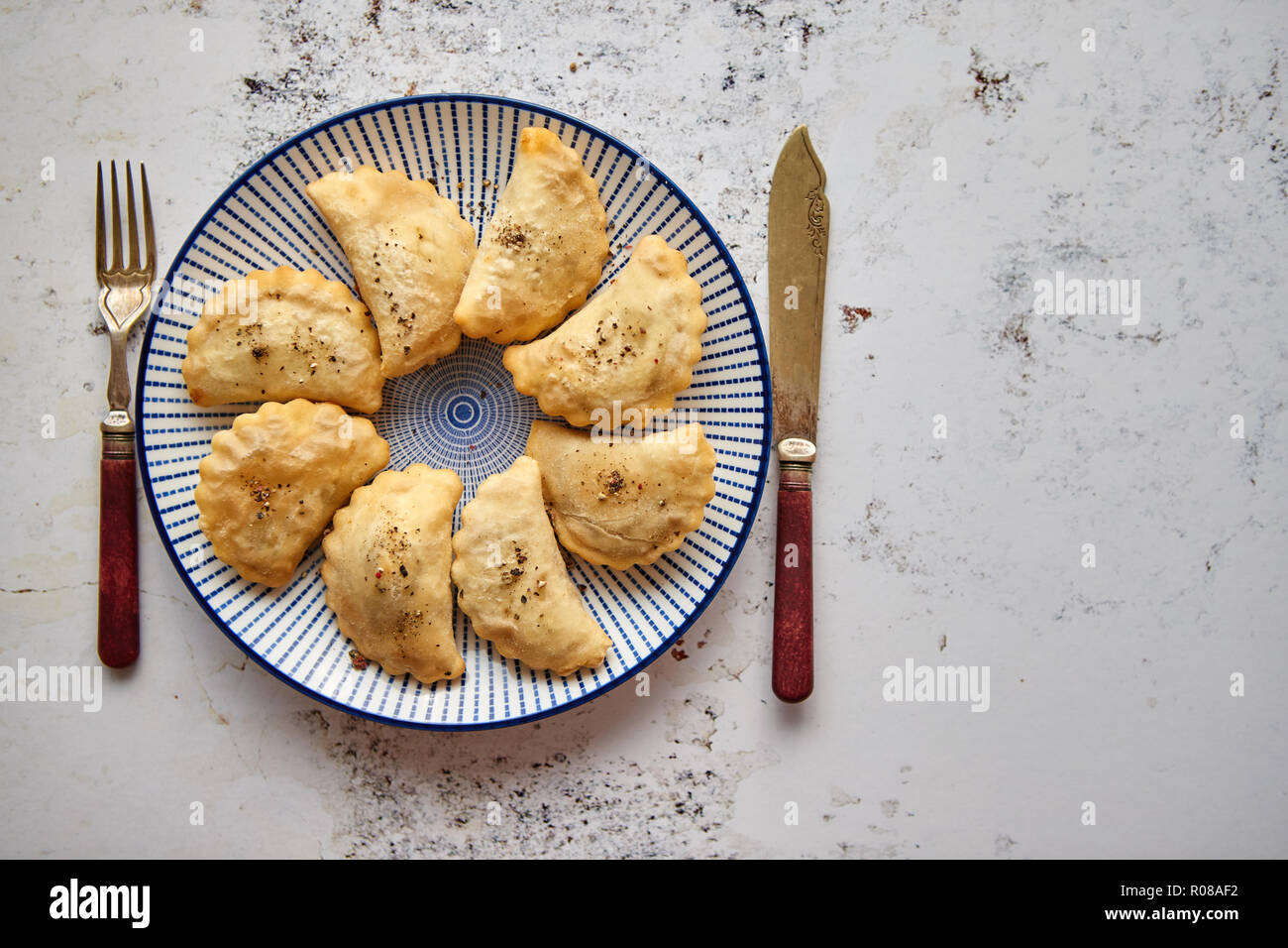 Hot and tasty deep fried polish dumplings with meat filling Stock Photo