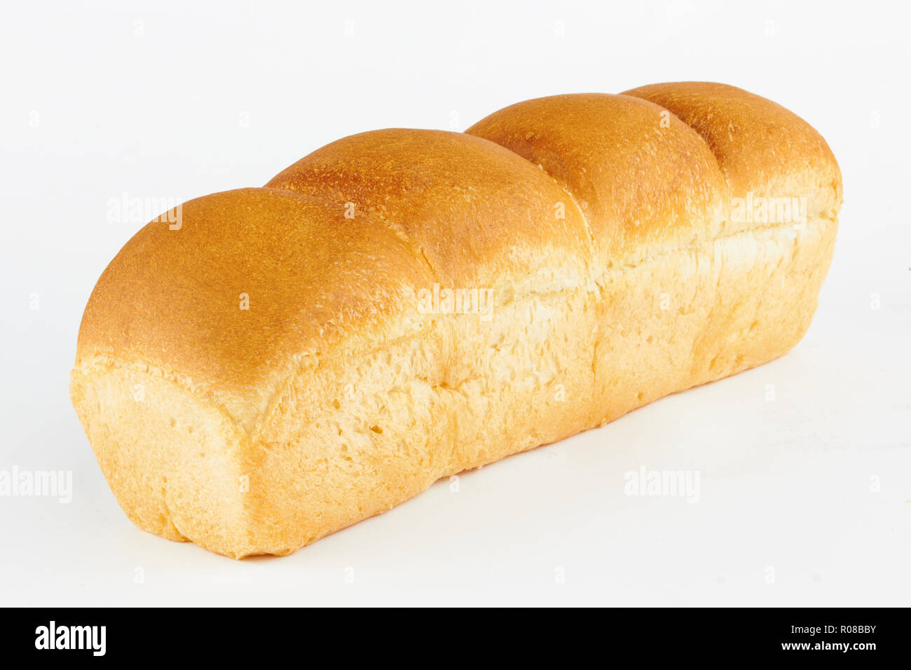 Loaf of bread on white background Stock Photo - Alamy