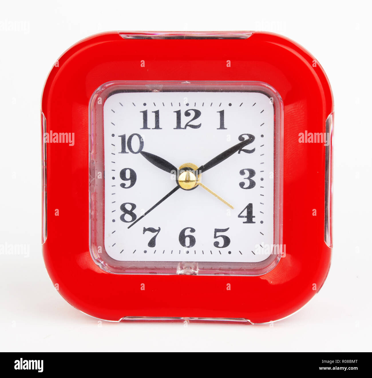 red alarm clock on a white background Stock Photo