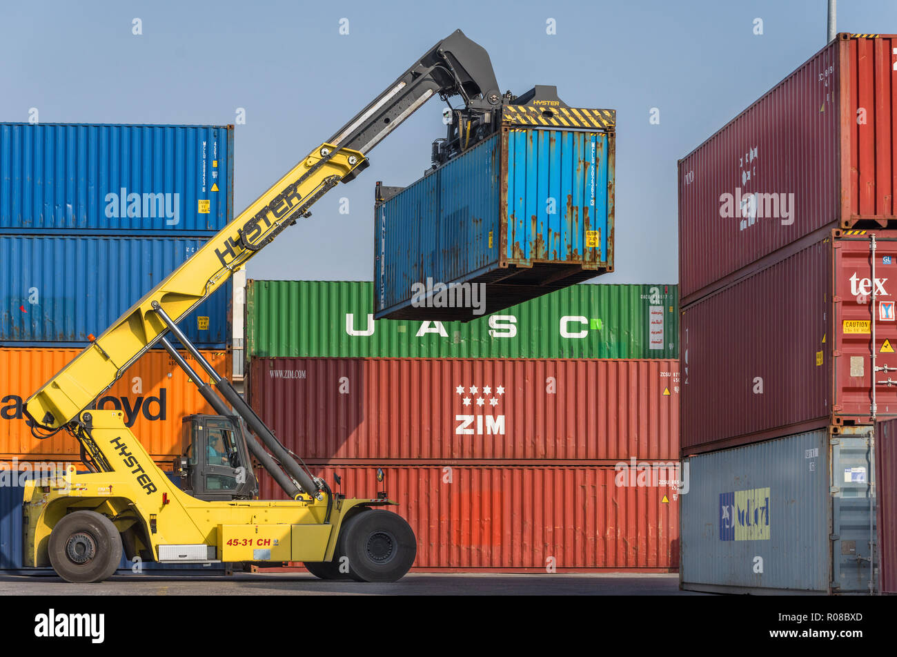 Containers shifting at the port warehouse Stock Photo