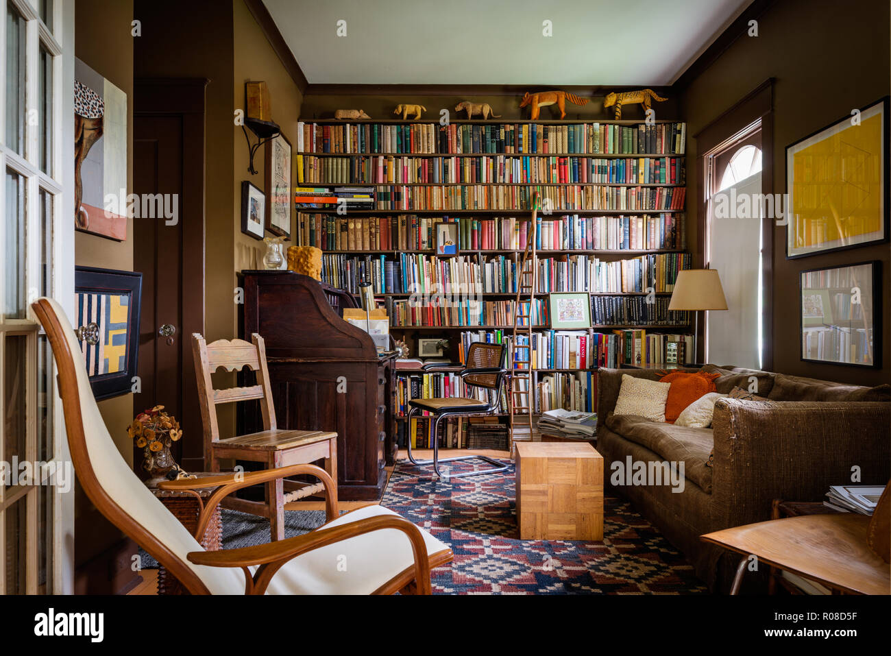 Retro living room with bookcase Stock Photo