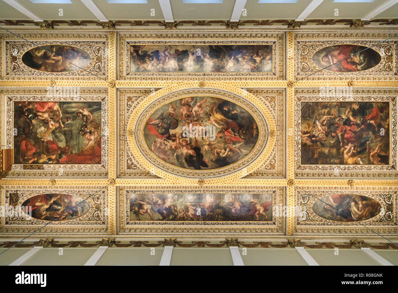 Banqueting Hall ceiling by Peter Paul Rubens with The Apotheosis of James I, the centerpiece painting, Banqueting House, Whitehall, London, UK Stock Photo