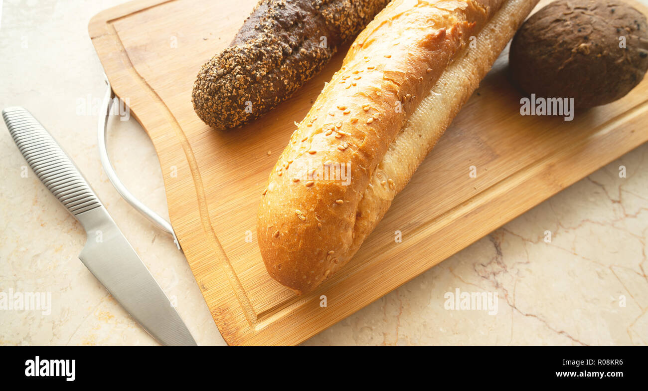 still-life with breads on hardboard Stock Photo