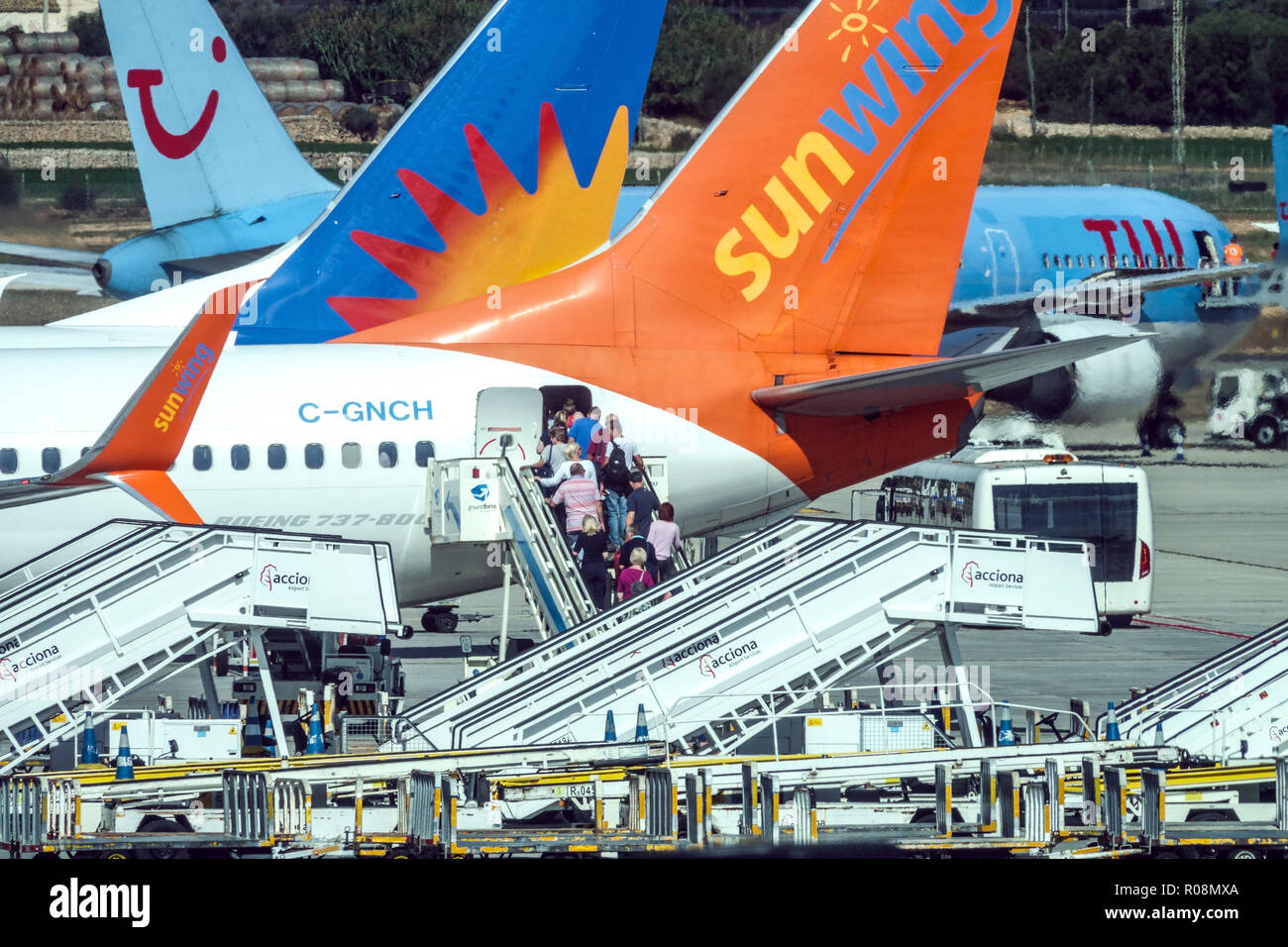 Airport Palma de Mallorca, passengers boarding plane Boeing 737, SunWing, Spain, Europe Stock Photo