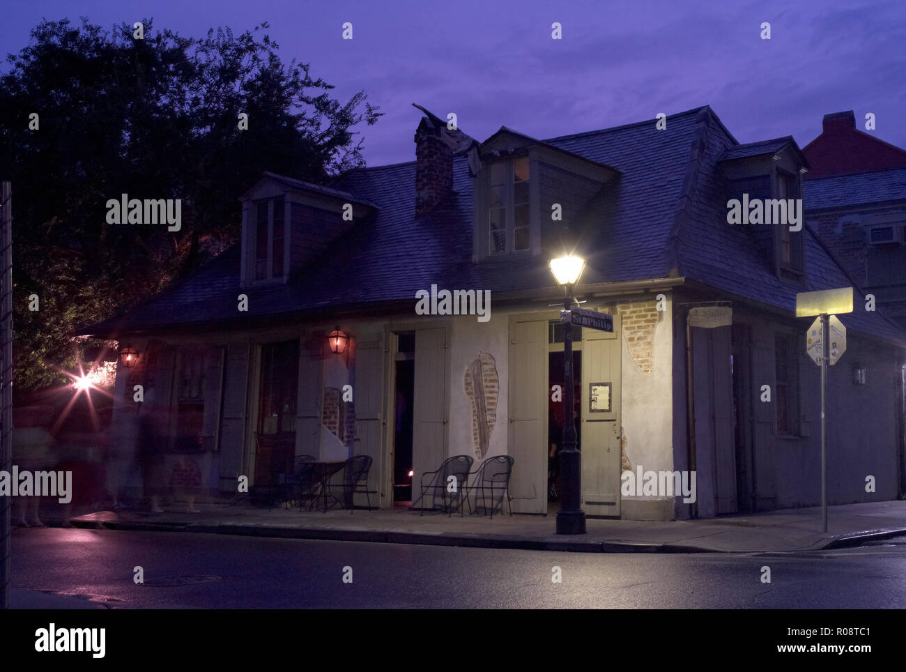 NEW ORLEANS, USA - JULY 18, 2009: Lafitte's Blacksmith Shop in New Orleans, Louisiana in the evening. A famous tourist attraction and old bar. Stock Photo
