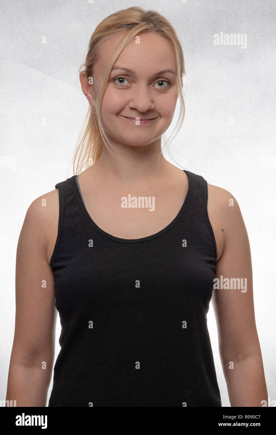 Person in white tank top hi-res stock photography and images - Alamy