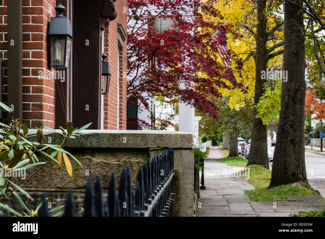 Charming homes and sidewalk in the town of Stonington, Connecticut, USA