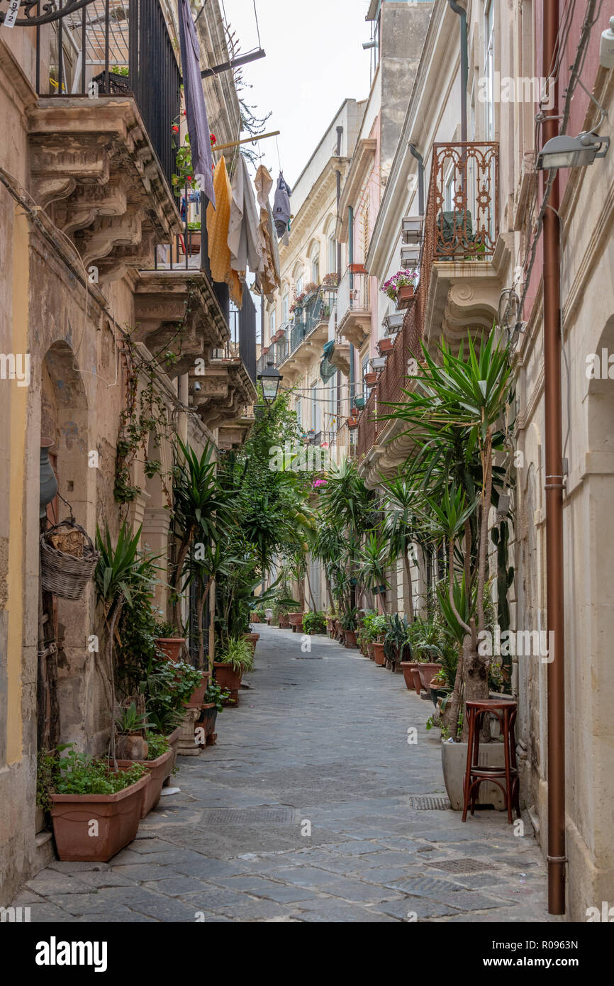 Narrow Street Scene with Houses and Balconies, Ortigia, Sicily Stock