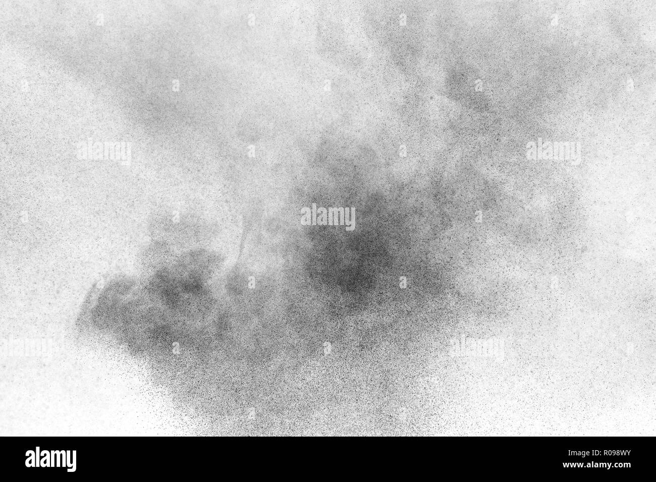 Black particles explosion isolated on white background. Abstract dust ...