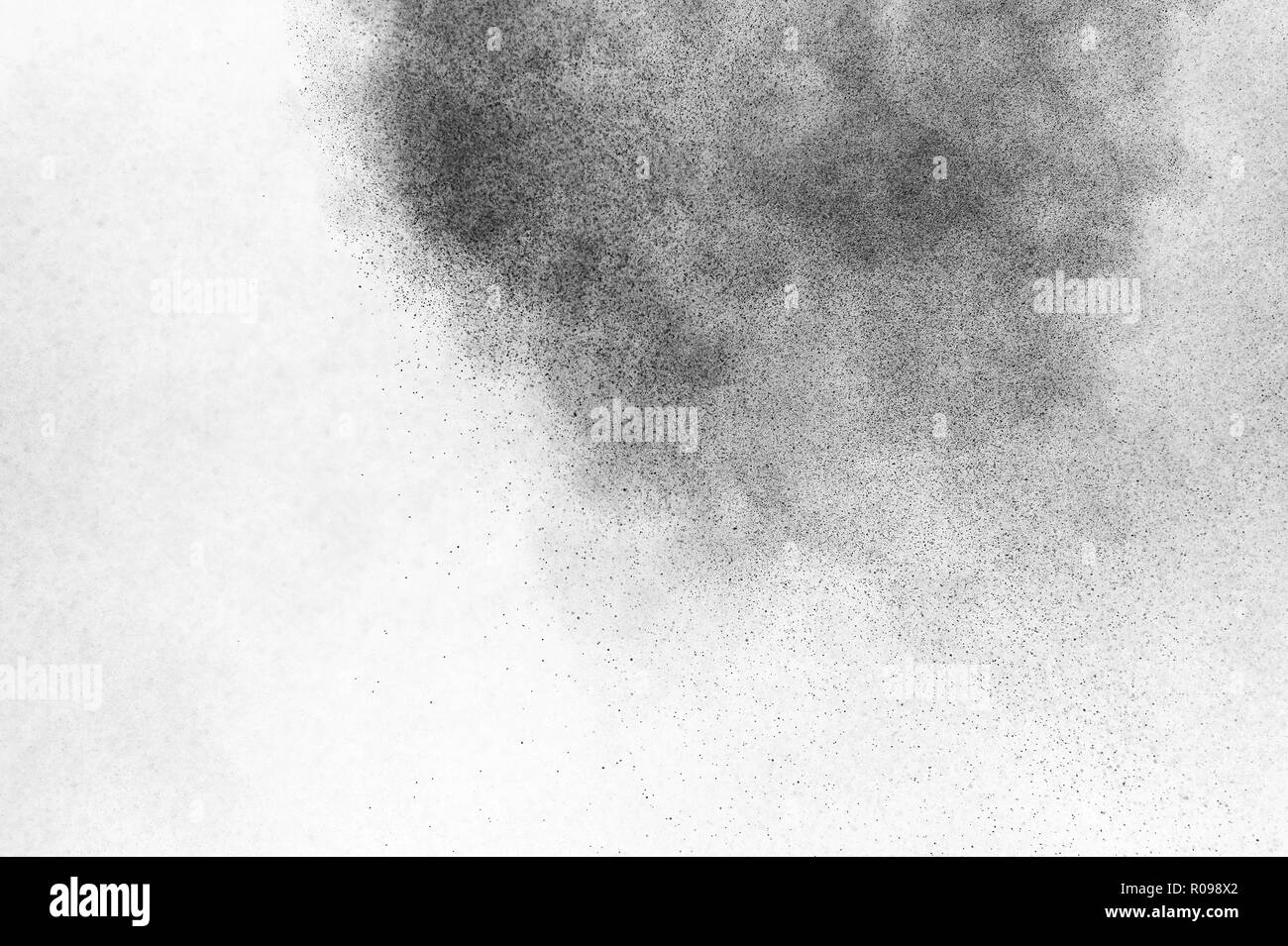 Black particles explosion isolated on white background. Abstract dust ...