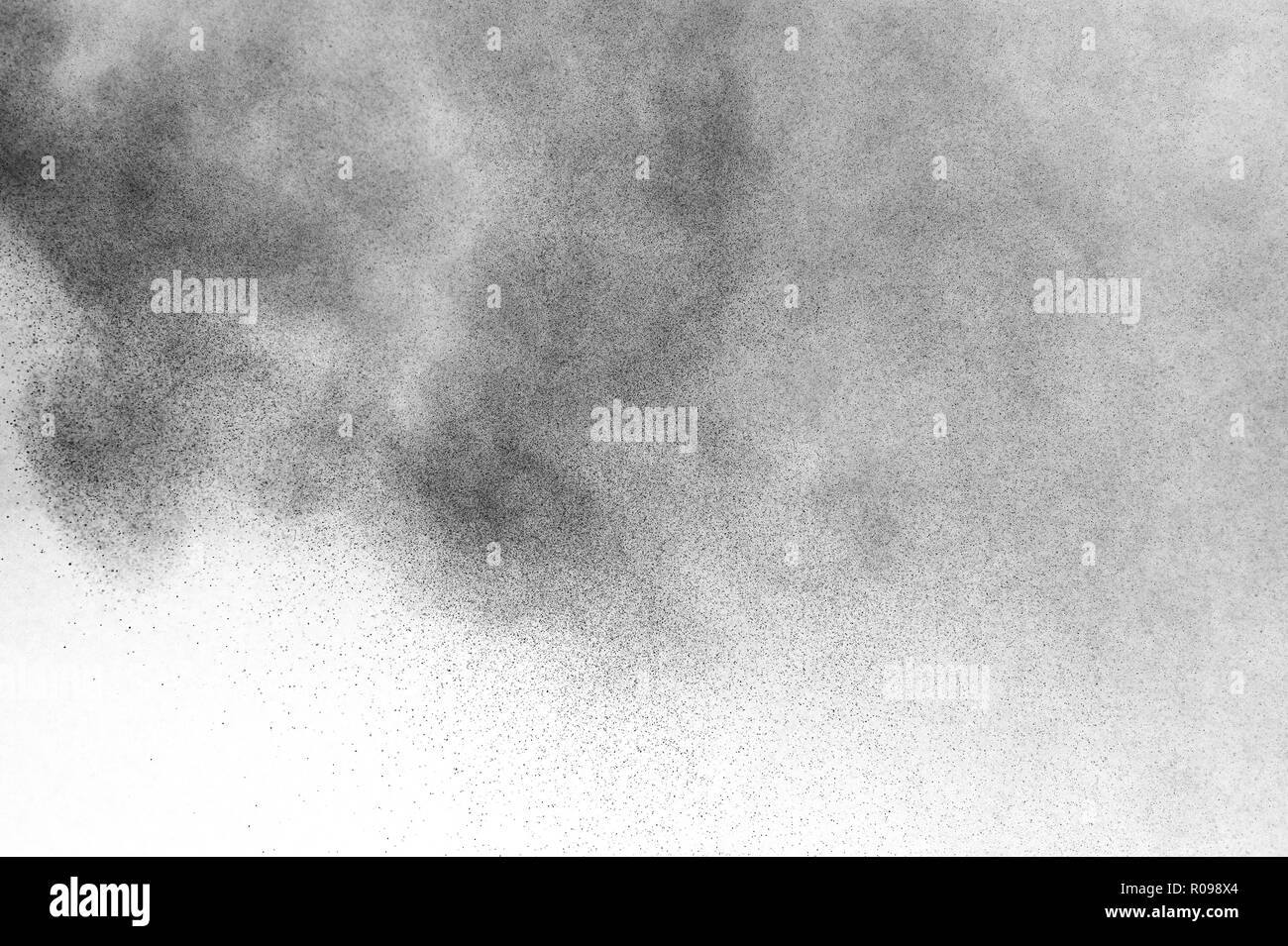 Black particles explosion isolated on white background. Abstract dust ...