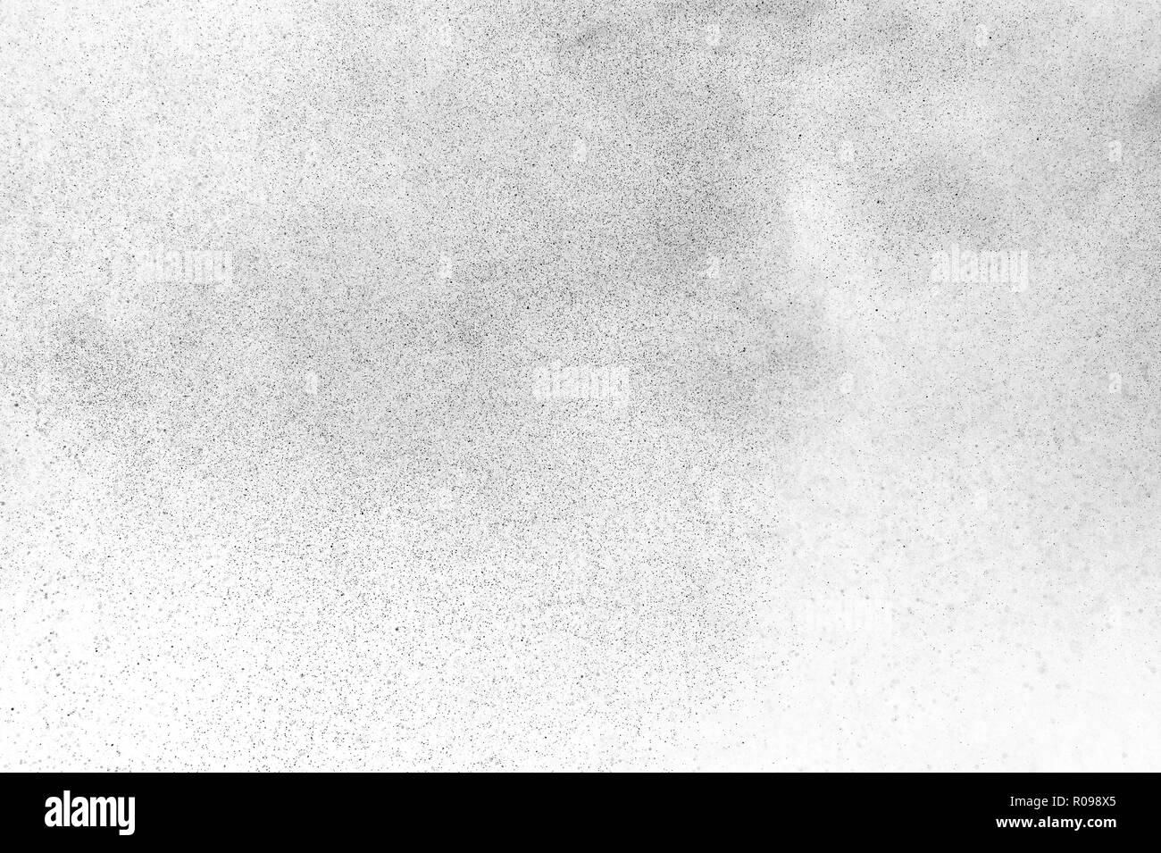 Black particles explosion isolated on white background. Abstract dust ...
