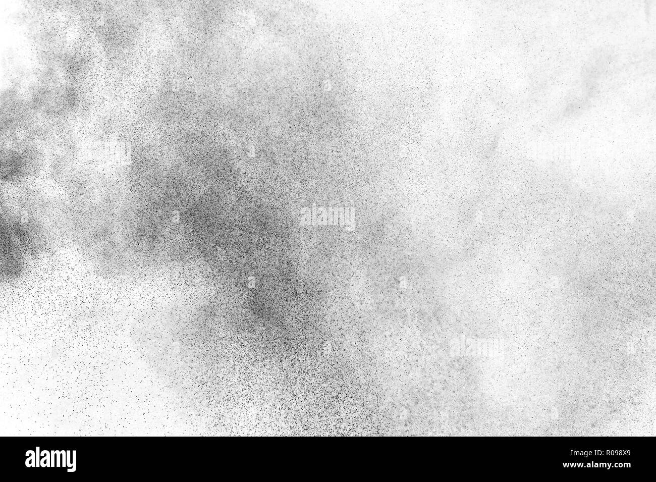 Black particles explosion isolated on white background. Abstract dust ...