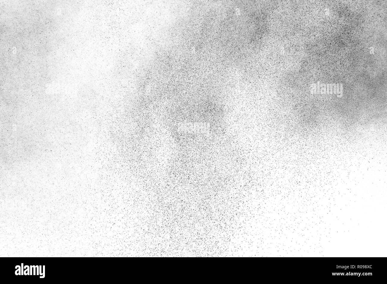 Black particles explosion isolated on white background. Abstract dust ...